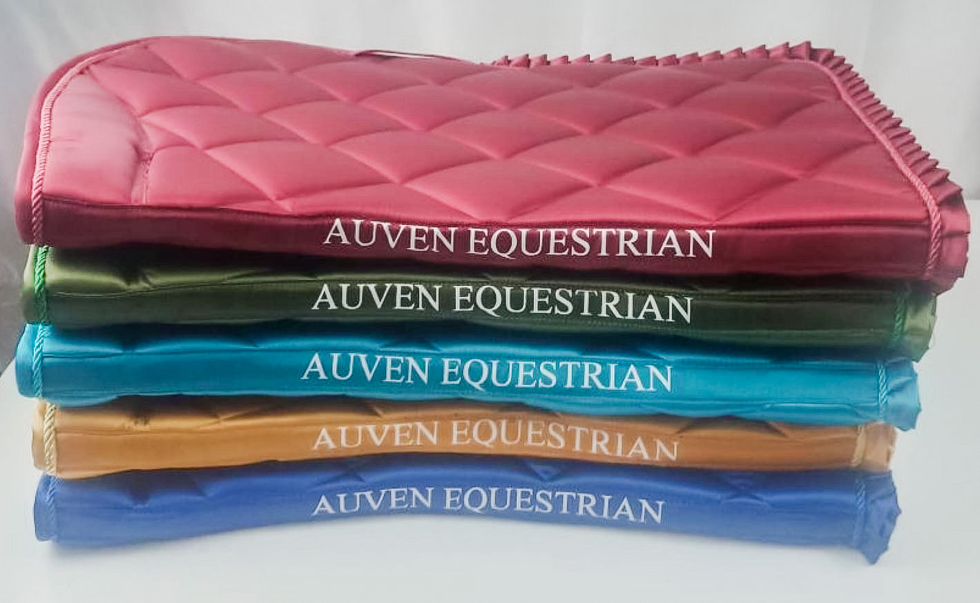 Spine of saddle pad with Auven Equestrian embroidery